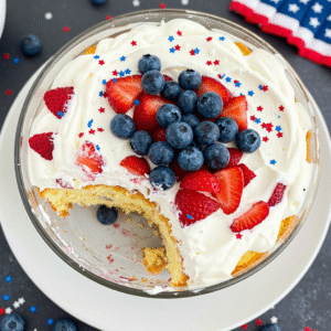 Patriotic 4th of July Berry Trifle with strawberries, blueberries, whipped cream, and cake