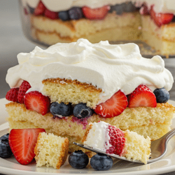 Patriotic 4th of July Berry Trifle with strawberries, blueberries, whipped cream, and cake