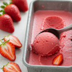 scooping strawberry sorbet for summer